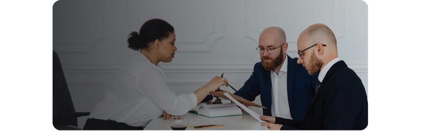 Business team reviewing software licence documents