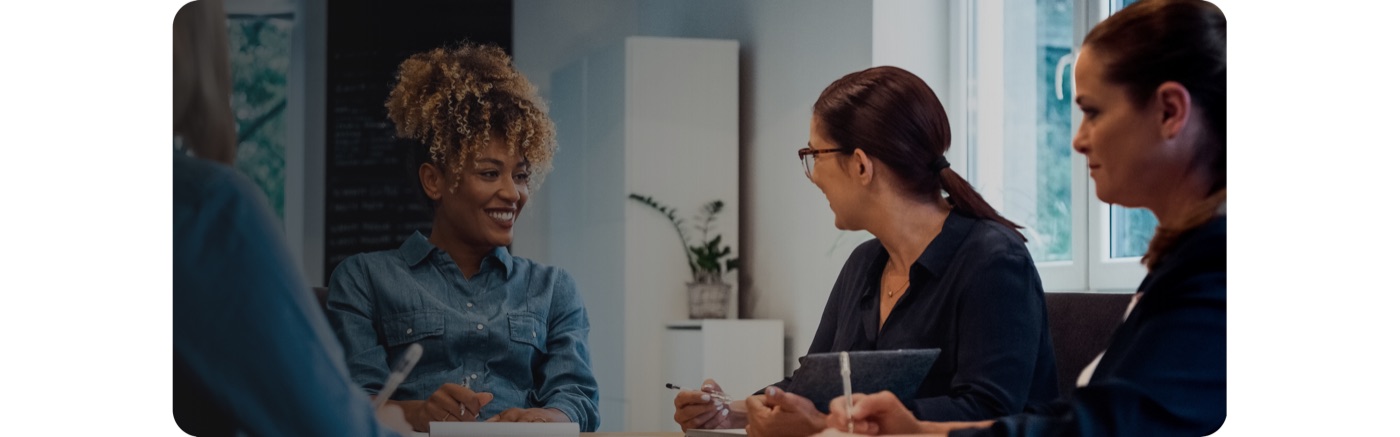 Business team talking together in a meeting room